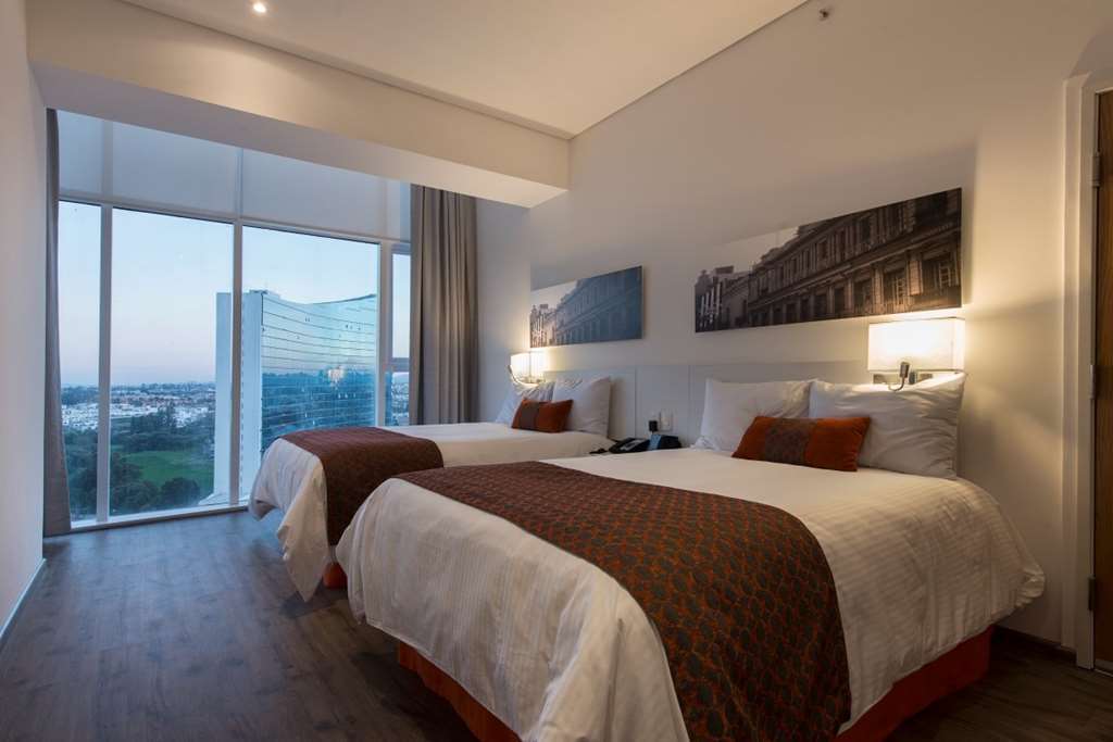Camino Real Puebla Hotel & Suites Номер фото